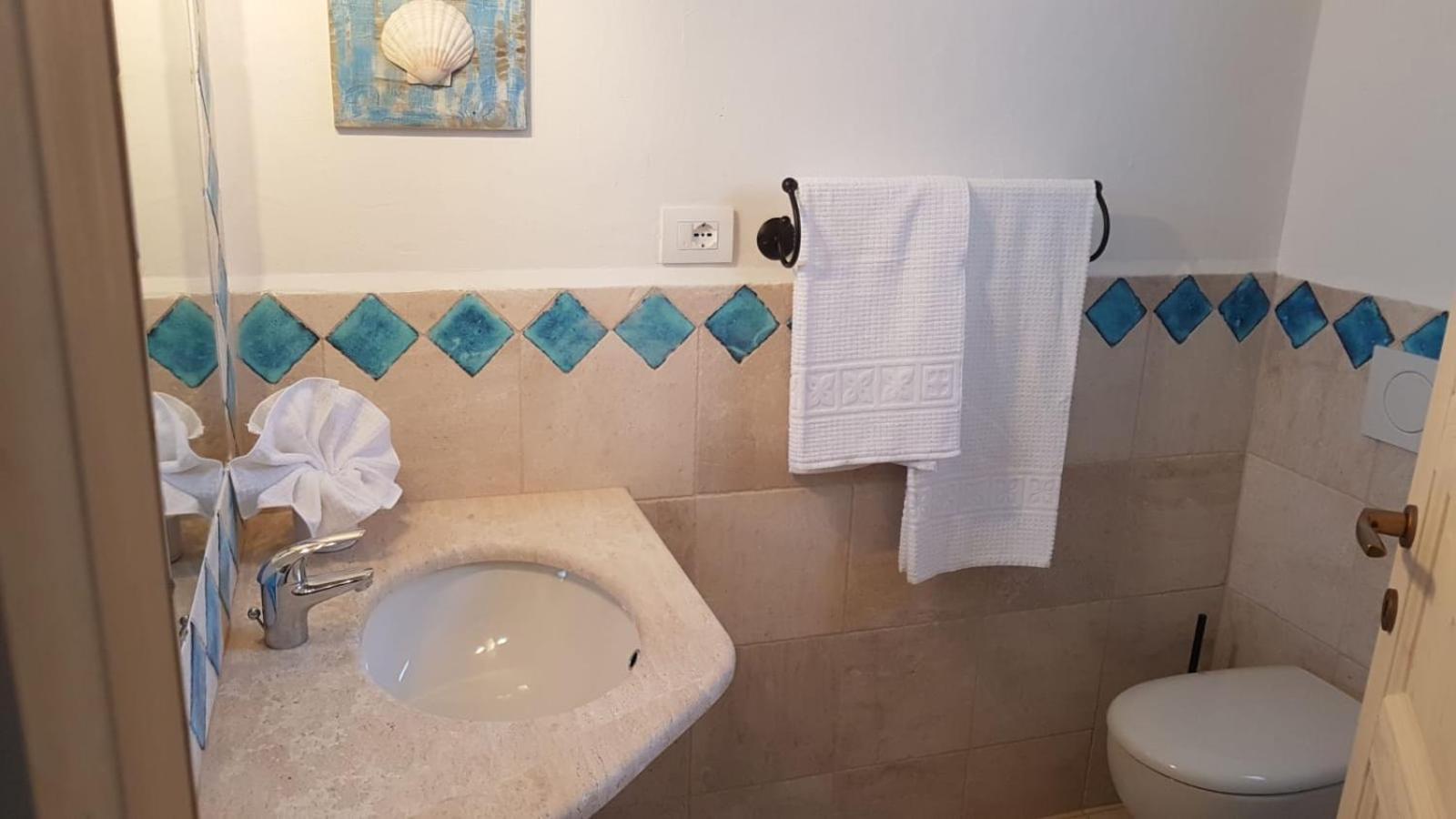 Residence Capraggia Cannigione Bagian luar foto