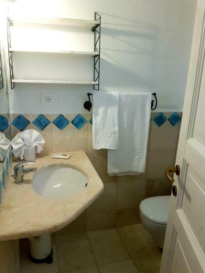 Residence Capraggia Cannigione Bagian luar foto